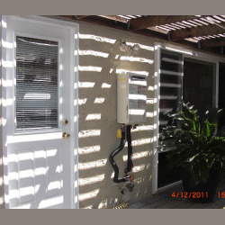 Clean outdoor tankless water heater installation