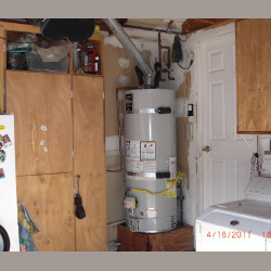 water heater near cabinets