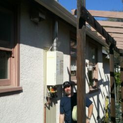 Clean outdoor tankless installation