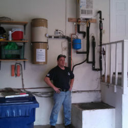 Water softener and tankless water heater installation in a garage